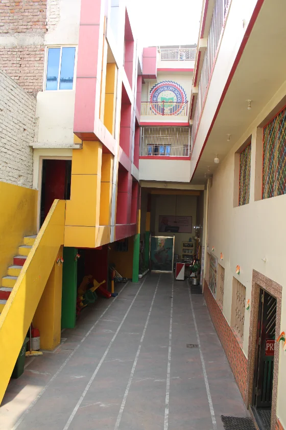 Students playing on the big playground at Children Glory High School, Morar, Gwalior